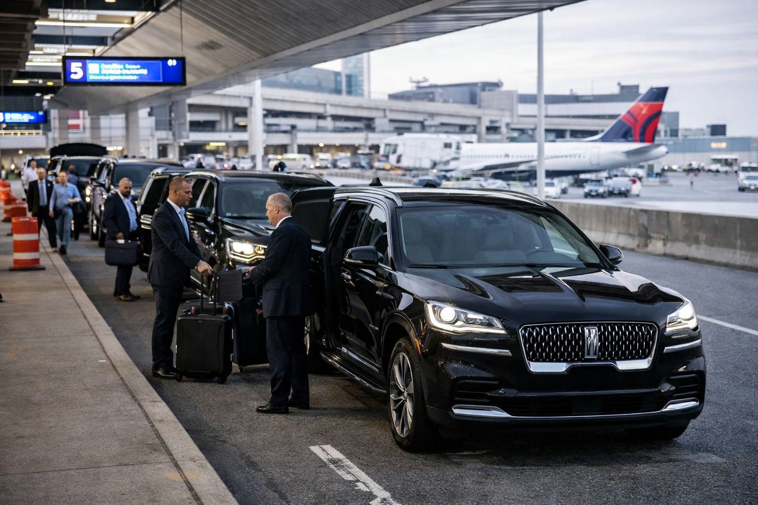 Logan Airport car service chauffeur pickup for Boston airport transportation